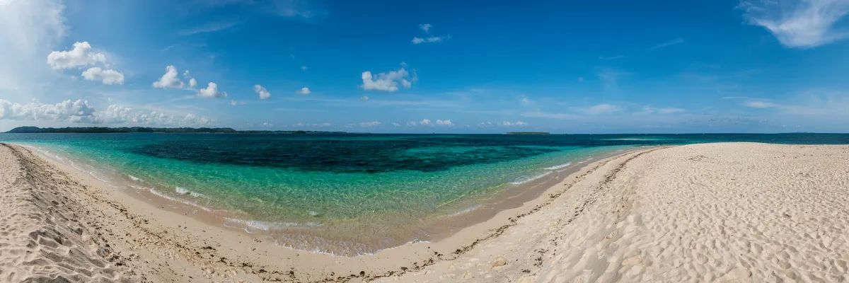 Naked Island sandbar surrounded by turquoise water near Siargao